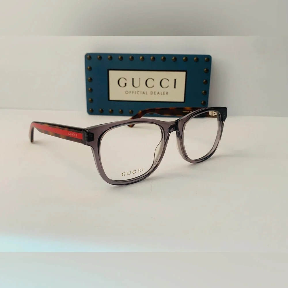Gucci's GG0004ON features soft lines frames acetate front. Iconic web effect